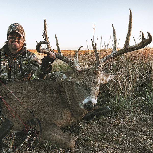 Nate Hosie with his biggest buck with a bow yet. 177 inches.