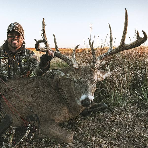 Nate Hosie with his biggest buck with a bow yet. 177 inches.
