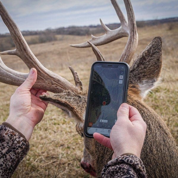 Hunter holding deer