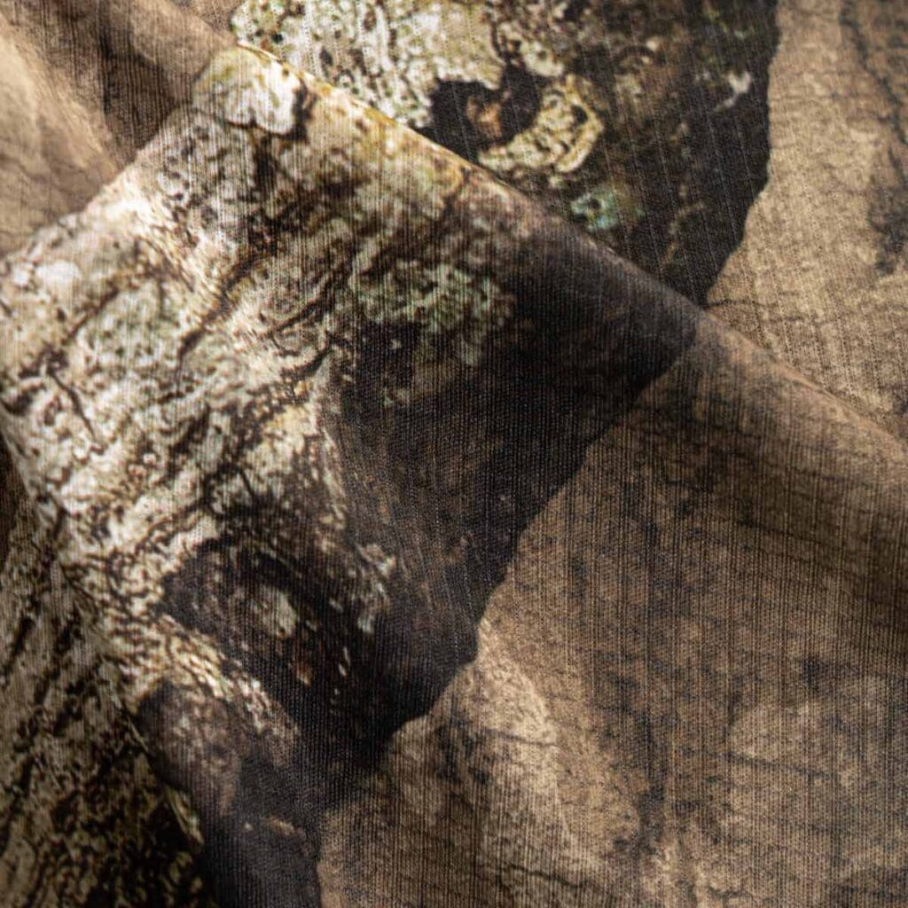 Touch-activated, cooling-infused polyester fabric